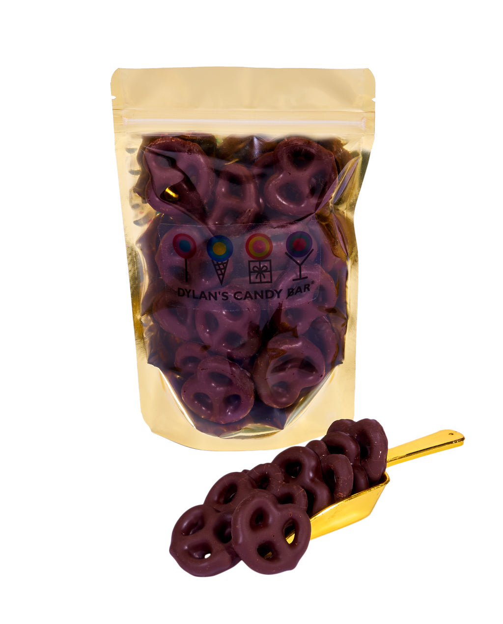 Mini Dark Chocolate-Covered Pretzels in resealable gold mylar bag next to Mini Dark Chocolate-Covered Pretzels overflowing from gold scoop