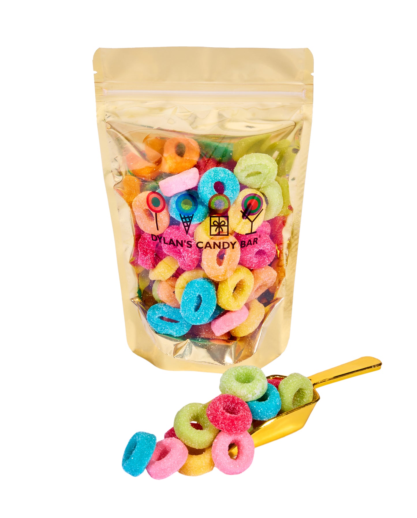 Sour Fruity Gummy Rings in resealable gold mylar bag next to Sour Fruity Gummy Rings overflowing from gold scoop