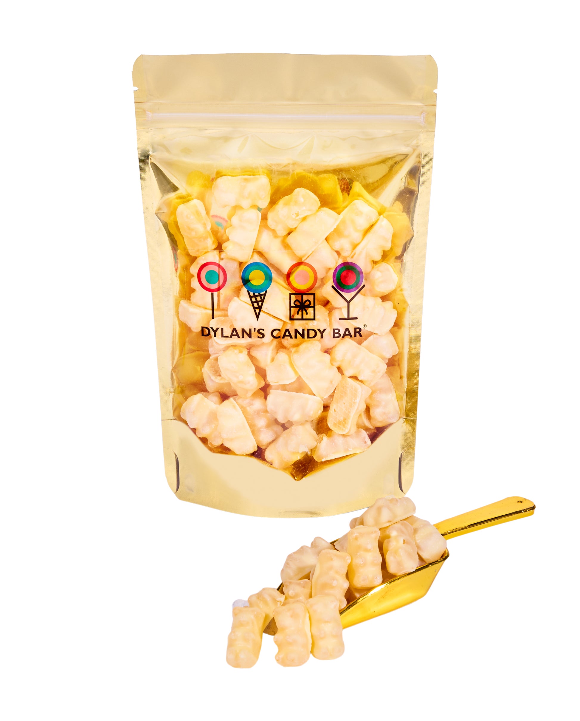 White Chocolate-Covered Fruity Gummy Bears in resealable gold mylar bag next to White Chocolate-Covered Fruity Gummy Bears overflowing from gold scoop